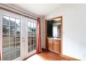 Bright living room shows glass doors to the deck and a convenient wet bar at 5060 Post Oak Ln, Rock Hill, SC 29732