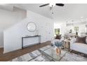 Bright living room featuring wood floors, stylish furniture, and an open concept layout at 8455 Old Plank Rd, Charlotte, NC 28216