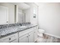 Bathroom featuring granite countertops, modern fixtures, and shower at 1550 Doran Ter, Richburg, SC 29729