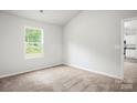 Neutral bedroom with carpeted floor, a bright window, and views of nature at 1568 Doran Ter, Richburg, SC 29729