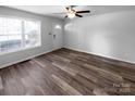 Bright and airy living room featuring sleek hardwood floors and plenty of natural light at 2725 Fair Oaks Dr, Gastonia, NC 28054