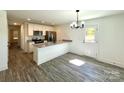 Well-lit kitchen with modern appliances and granite countertops at 324 Ashford St, Chester, SC 29706