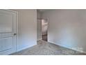 Cozy bedroom with neutral carpet and natural light at 9534 Maltese Dr, Gastonia, NC 28056