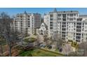 Stunning aerial view showcasing this luxury condo building and well-kept grounds at 2823 Providence Rd # 236, Charlotte, NC 28211