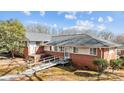 Spacious home with a ramp for easy access and a beautiful, sunny exterior view at 3120 Minnesota Rd, Charlotte, NC 28208