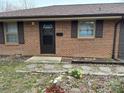 Charming front entrance with a brick facade and decorative door at 410 Yadkin St, Salisbury, NC 28146