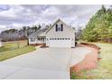 Lovely single Gathering home with a two-car garage and long driveway at 4205 Ore Bank Dr, Lincolnton, NC 28092