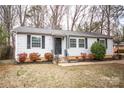 Inviting exterior of a well-kept home with a manicured front yard and classic curb appeal at 4910 Lailwood Cir, Charlotte, NC 28227