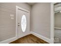 Inviting entryway featuring a decorative front door and hardwood floors at 801 Sandifer Rd, York, SC 29745