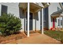 Inviting front porch featuring tidy landscaping, a covered entrance, and a well-maintained exterior at 1008 Beaugard Dr, Charlotte, NC 28208