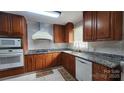 Well-equipped kitchen featuring granite countertops, stainless steel appliances, and ample cabinet space at 3272 Hunter Ridge Rd, Rock Hill, SC 29732