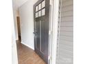 Welcoming front door view into a home featuring stylish interior design and modern updates at 519 N State St, Lincolnton, NC 28092