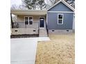 Charming single-Gathering home featuring a welcoming front porch and neatly kept front yard at 519 N State St, Lincolnton, NC 28092