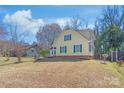 A well maintained backyard, enclosed by a fence, offers plenty of room at 6626 Somersworth Dr, Charlotte, NC 28215