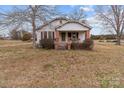 Charming single Gathering home featuring brick columns and front porch at 825 Rock Grove Church Rd, Salisbury, NC 28146