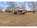 Charming single Gathering home featuring brick columns and front porch at 825 Rock Grove Church Rd, Salisbury, NC 28146