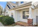 Welcoming front entrance of a townhome with stylish brick accents at 1509 Tiana Way, Rock Hill, SC 29732