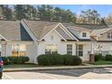 Well-maintained townhome showcasing a covered porch and beautiful curb appeal at 1509 Tiana Way, Rock Hill, SC 29732