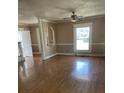 Inviting living room features hardwood floors, neutral paint, and abundant natural light at 222 2Nd Ave, Albemarle, NC 28001