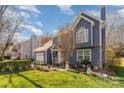 Beautiful exterior view featuring a two-story home, manicured lawn, chimney, and inviting front yard at 3601 Rosedown Dr, Matthews, NC 28105