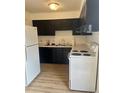 Bright kitchen features modern appliances and sleek cabinetry with ample countertop space at 4520 Central Ave # C, Charlotte, NC 28205