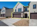 Attractive two-story home with a two-car garage and manicured lawn at 150 Shields Dr, Lincolnton, NC 28092