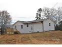 This home features a back deck, white siding and a well maintained exterior at 2400 Pressley Rd, Chester, SC 29712