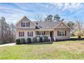 Charming home with a cozy front porch and well-maintained landscaping at 5369 Concord Rd, York, SC 29745