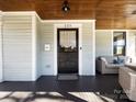 Inviting front porch featuring a dark wood ceiling and lounge area at 225 Marion St, Rock Hill, SC 29730