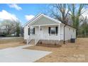 Attractive single-story home with a welcoming porch, fresh exterior paint, and a tidy front yard at 423 N Caldwell St # 2, Salisbury, NC 28144