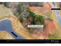 Aerial view of the lot at 5104 Lowie Ln, Gastonia, NC showing property lines and surrounding neighborhood at 5104 Lowie Ln # 23, Gastonia, NC 28056