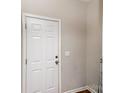 Simple white interior door with chrome knob and white trim at 105 Burlingame Ct # B, Mooresville, NC 28117