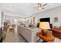 Open-concept living room featuring modern decor, recessed lighting, and seamless flow to the kitchen at 1323 Stack Rd, Monroe, NC 28112