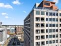 Modern condominium with balconies and city views, offering a luxurious urban living experience at 222 S Caldwell St # 1803, Charlotte, NC 28202