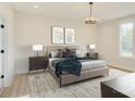 A spacious bedroom with a neutral palette, natural light, and stylish furniture at 2355 Emanuel Church Rd, Rockwell, NC 28138