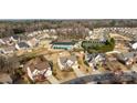 Beautiful aerial view of a residential neighborhood with community pool and tennis courts at 252 Legend Dr, Rock Hill, SC 29732