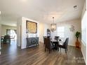 Bright dining room featuring wood floors, chandelier, and elegant decor at 9025 Remnick Dr, Gastonia, NC 28056
