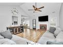 Bright living room featuring a fireplace and modern finishes at 13930 Thompson Rd, Mint Hill, NC 28227