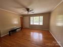 Bright living room featuring hardwood floors, neutral walls, and large windows at 2458 Morningside Dr, Lancaster, SC 29720