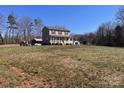Attractive home with a large front yard, perfect for outdoor enjoyment and curb appeal at 3032 Morning Glory Ln, Vale, NC 28168