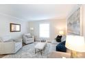 Bright living room with plush seating, stylish decor, and natural light at 3520 Colony Rd # E, Charlotte, NC 28211