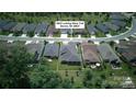 An aerial view shows the layout of this property and surrounding homes in Denver, NC at 4922 Looking Glass Trl, Denver, NC 28037