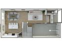 Open-concept floor plan featuring a kitchen, dining area, living room, powder room, laundry, and one car garage at 7008 Matz Way, Charlotte, NC 28269