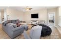 Cozy living room with comfortable seating, a large TV, and an inviting atmosphere at 3002 Paddington Dr, Indian Trail, NC 28079