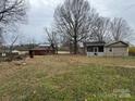 A small ranch home with a detached garage and big backyard at 3708 Secrest Shortcut Rd, Monroe, NC 28110