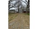 A small ranch home with a detached garage and small backyard at 3708 Secrest Shortcut Rd, Monroe, NC 28110
