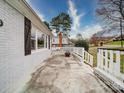The backyard patio is perfect for entertaining with ample seating space and a view of the neighborhood at 5743 Cherrycrest Ln, Charlotte, NC 28217