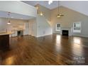 Bright, open living space with hardwood floors, fireplace and high ceilings at 2927 Clemson Ave, Charlotte, NC 28205