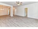 Spacious living area with light wood floors, ample natural light, and a neutral color scheme at 5609 Morgan Mill Rd, Monroe, NC 28110