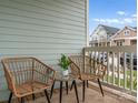 Cozy balcony with comfortable seating and a view of the neighborhood. Ideal for enjoying the outdoors at 917 Herrons Ferry Rd, Rock Hill, SC 29730